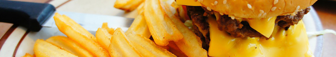 Eating Burger Hot Dog at Lucky's Last Chance - Queen Village restaurant in Philadelphia, PA.